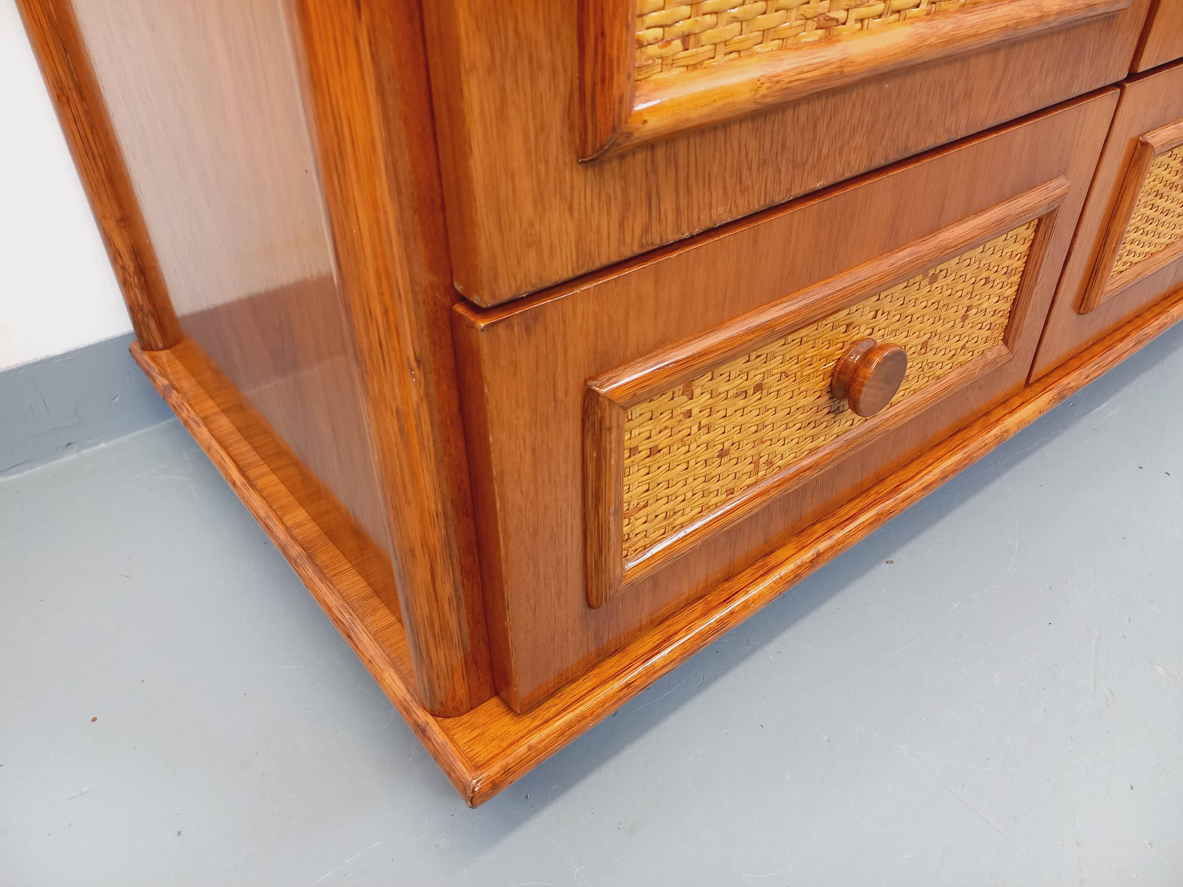 Vintage woven rattan and wood armoire by Maugrion for Roche-Bobois.