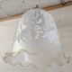 Suspension style Art Nouveau glass globe with screen-printed floral pattern.