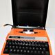 Silver Reed 200 orange metal typewriter made in Japan 70s