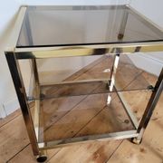 Gold metal and smoked glass serving trolley