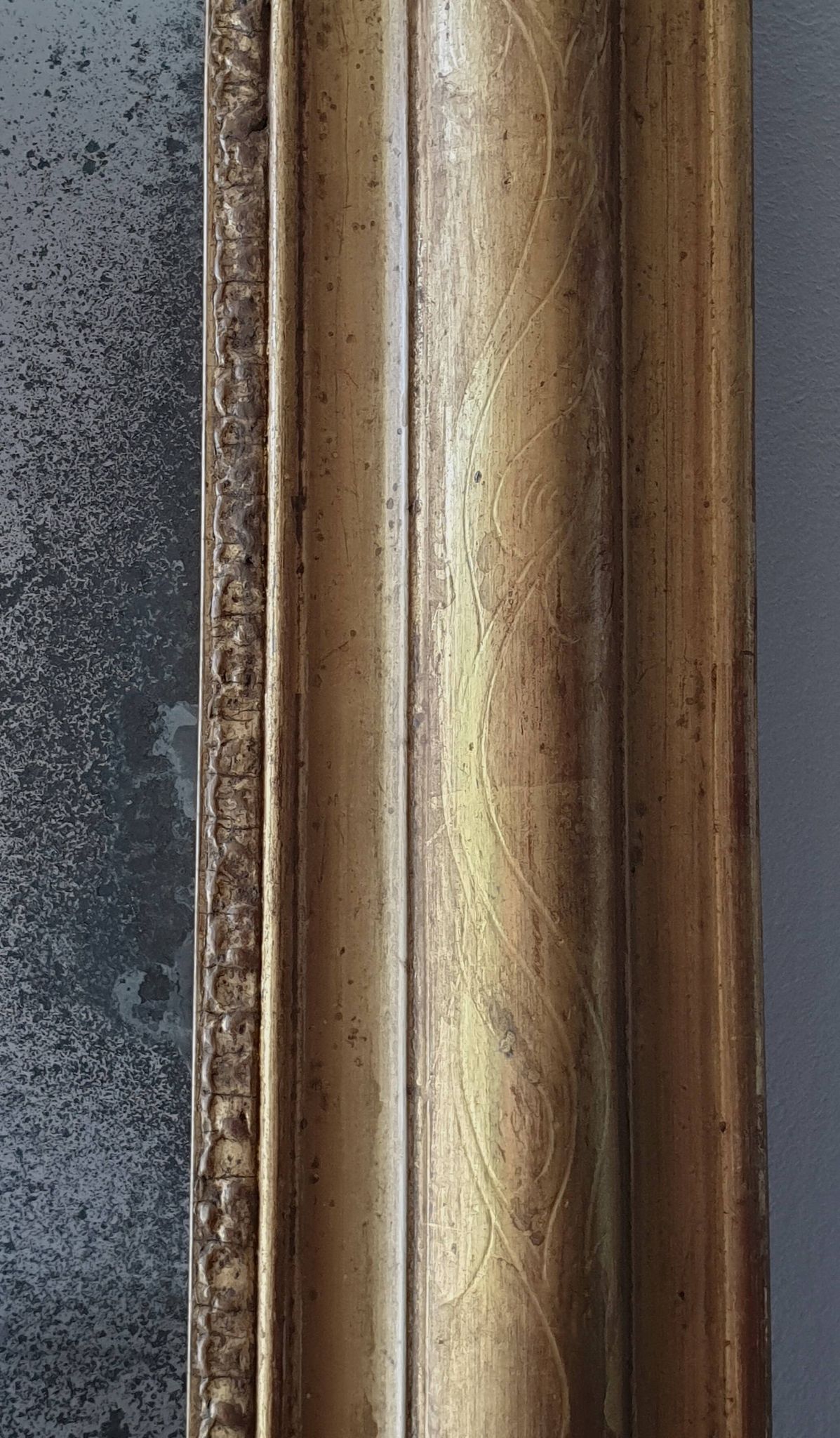 Old gilded mirror and old mercury glass - wall mirror with gold leaf