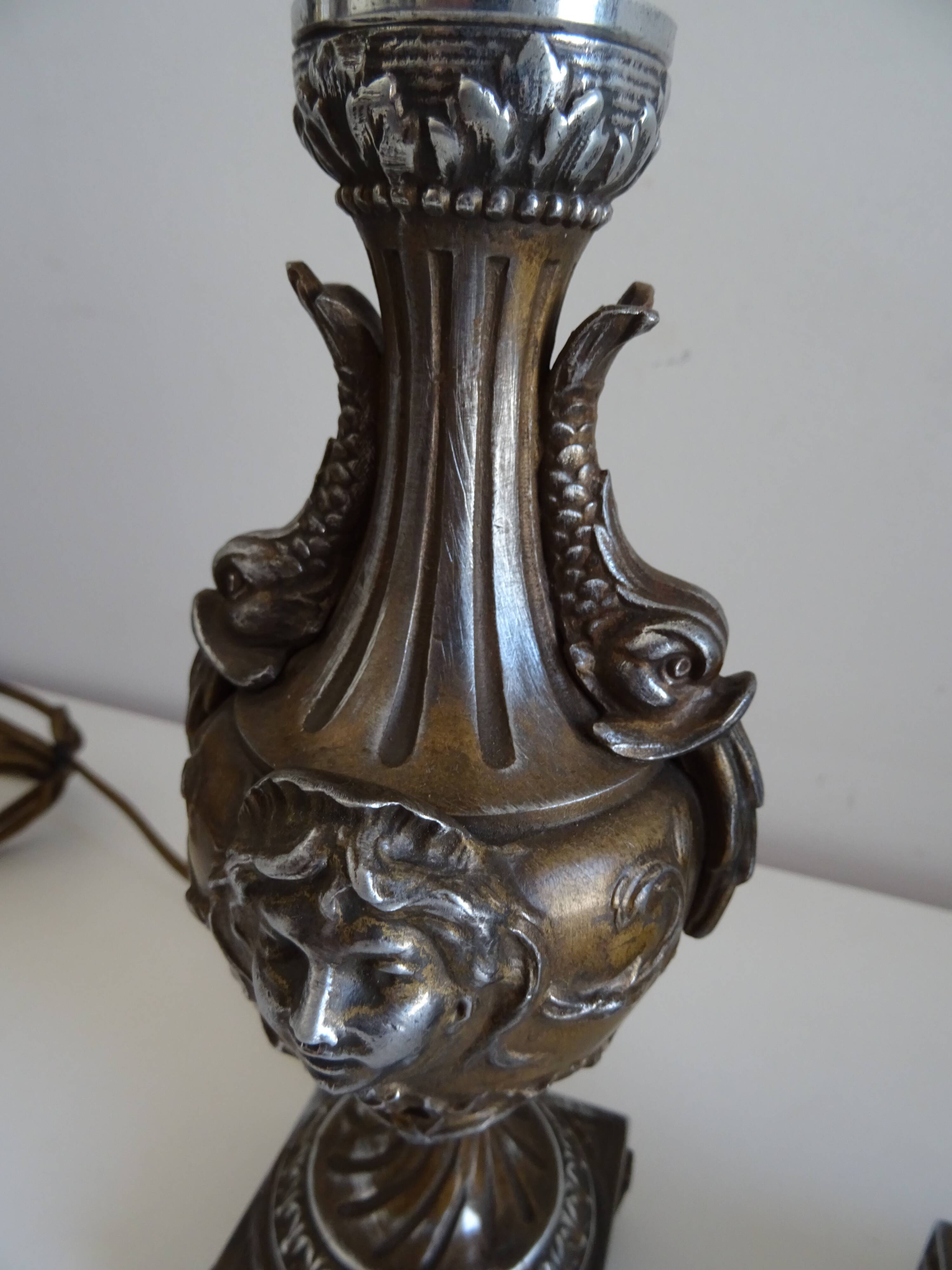 Pair of Louis XVI style lion and cherub decoration lamps