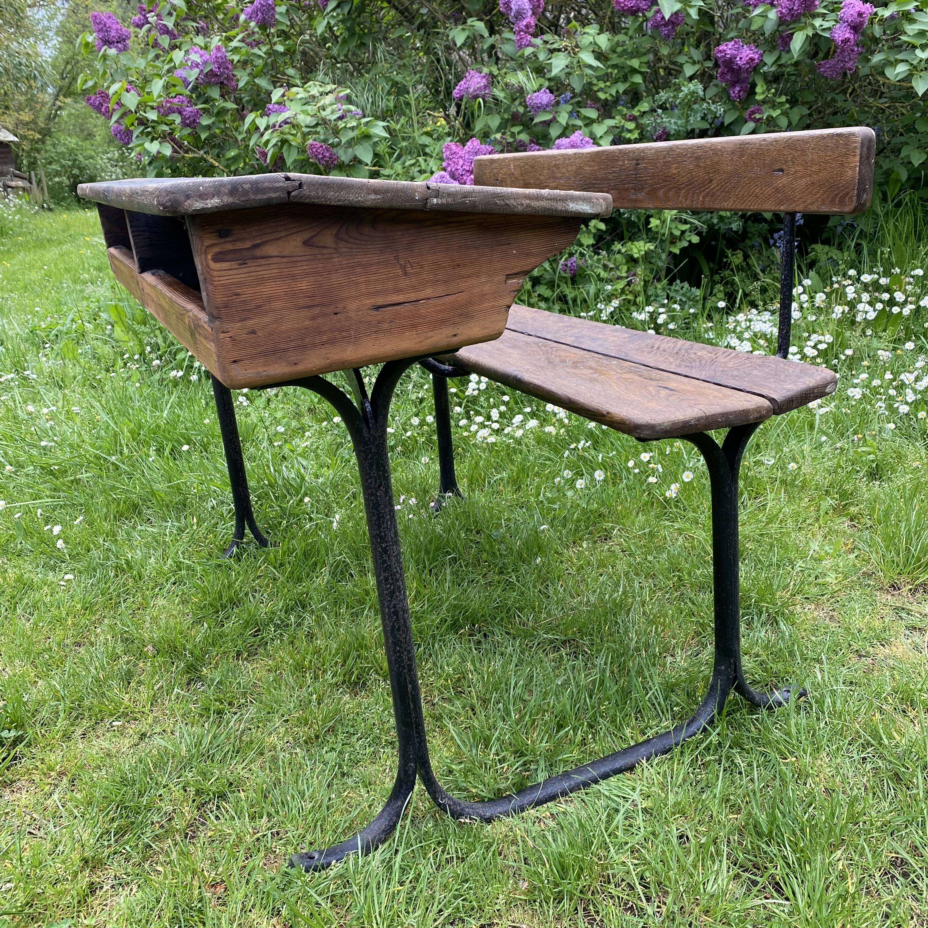 Old school desk in wood and cast iron
