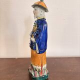 Chinese Porcelain Sculpture of a Manchu Mandarin Qing Pipe Smoker