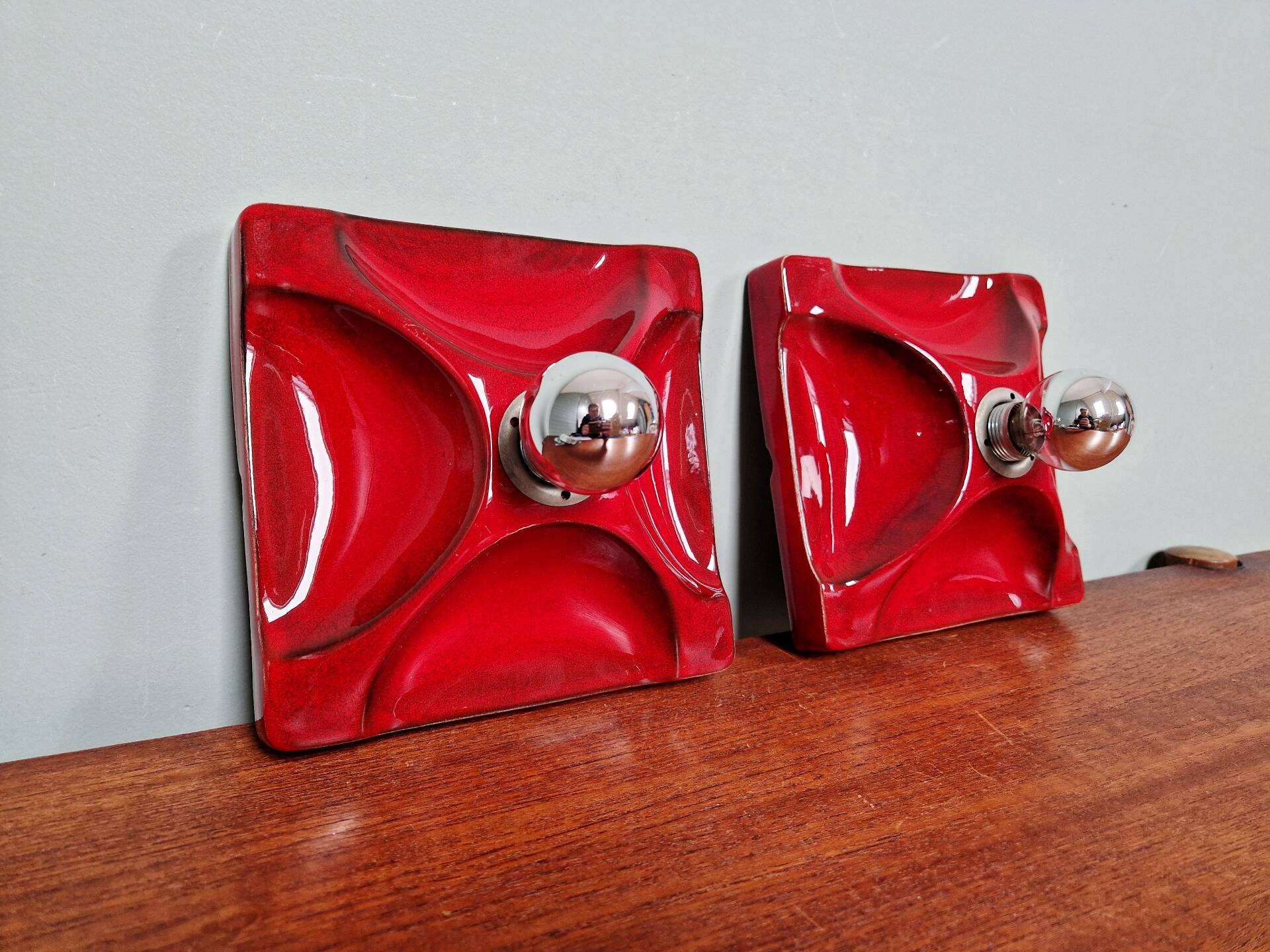 Pair of Space Age wall sconces in red ceramic, 1970.