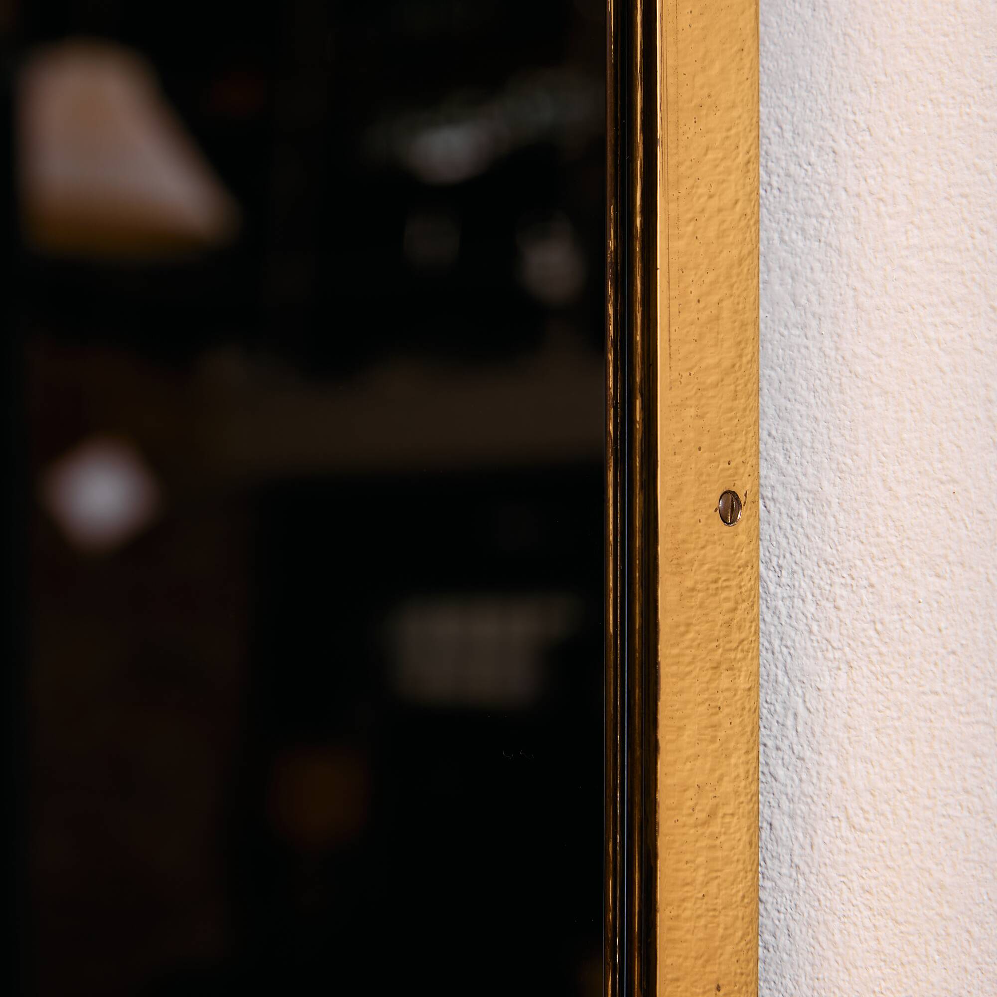 Metal and brass framed mirror
