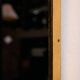 Metal and brass framed mirror