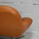Sofa "space age". Leather, fiberglass, foam, steel. Circa 1970. Orange.