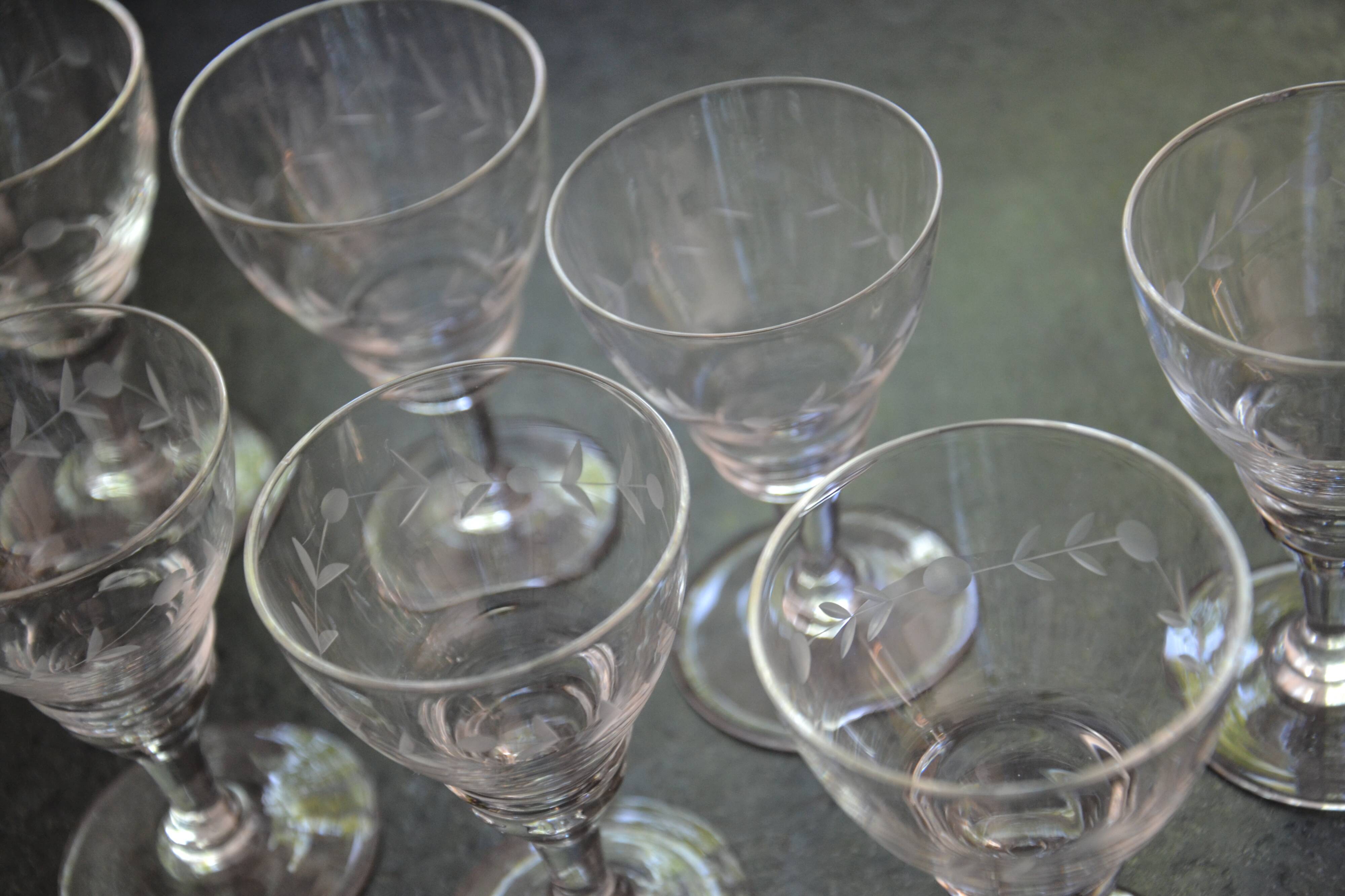 8 small old chiseled glasses