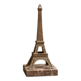 Vintage Eiffel Tower bookend in patinated metal on a marble base.