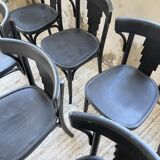 Set of 7 black bistro chairs