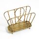 Rare Mid Century Modern magazine rack made of solid brass and genuine bambo