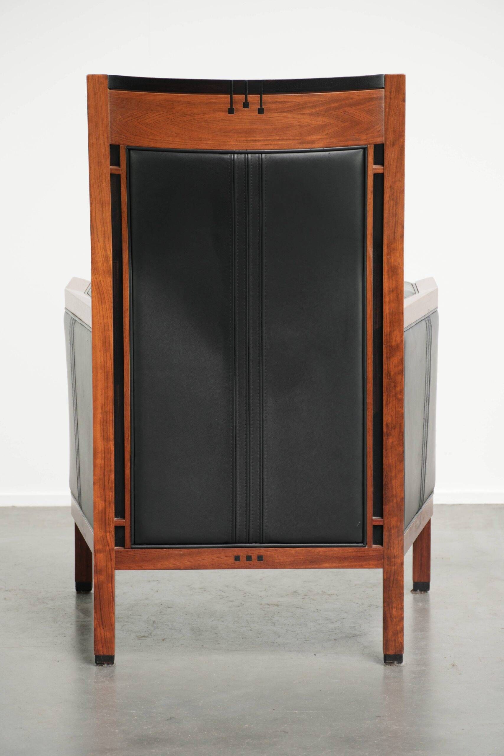 Cow leather Art Deco design armchair with a timeless look