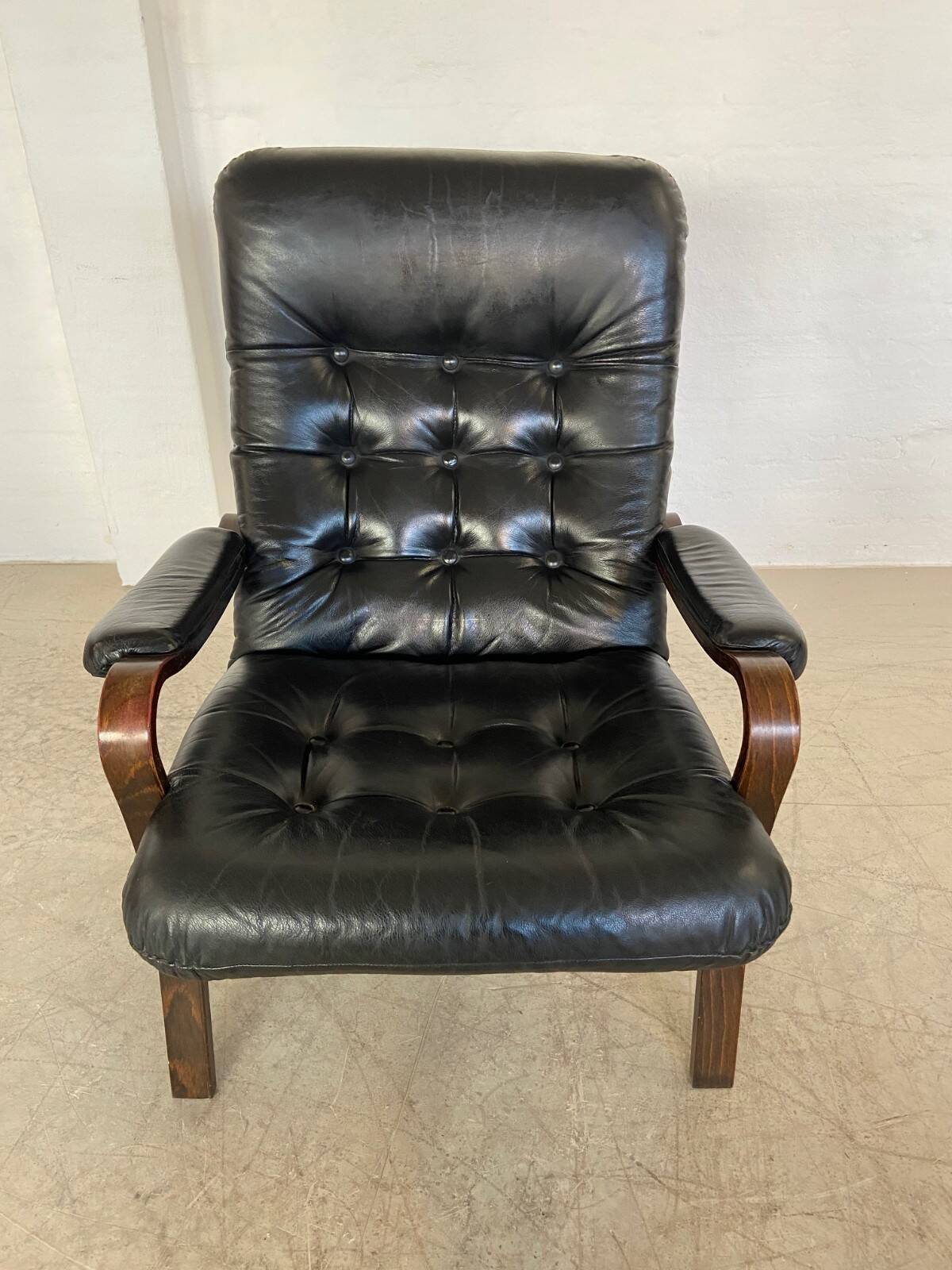 Vintage mid-century Scandinavian black leather lounge chair 1970s