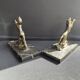 Pair of art deco marble and patinated regulated bookends