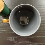 Cup and creamer set