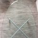 Design coffee table in beveled glass and steel foot