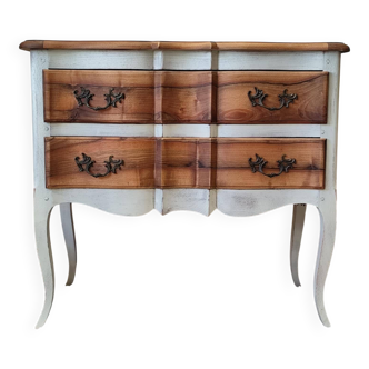 Walnut crossbow chest of drawers