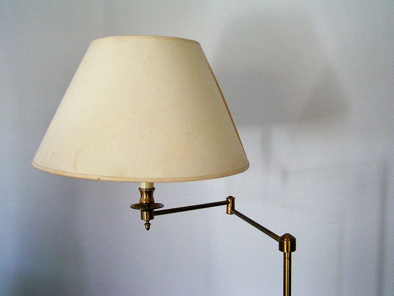 Articulated brass floor lamp