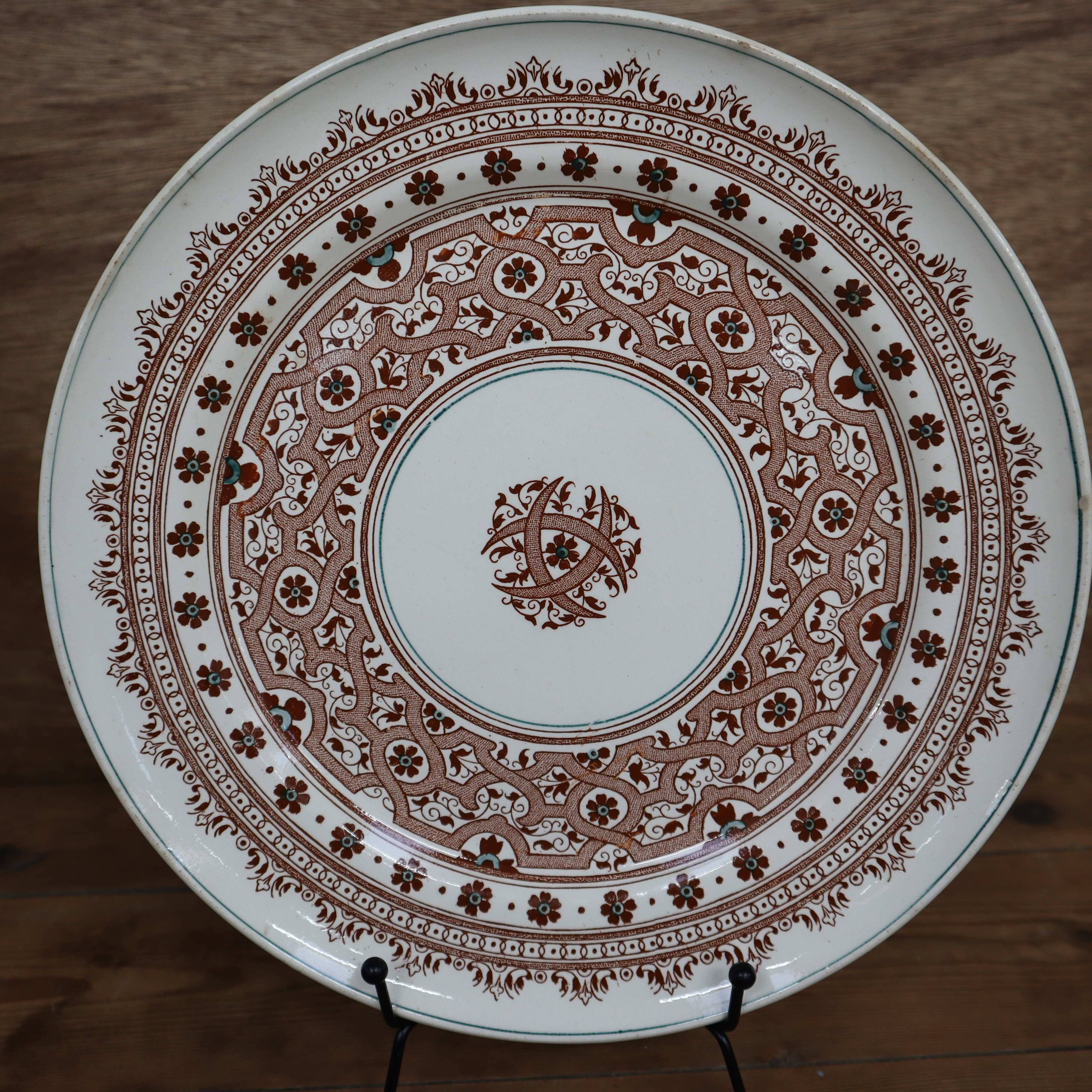Old 26cm dish in Terre de Fer earthenware from Longwy, Henri II model