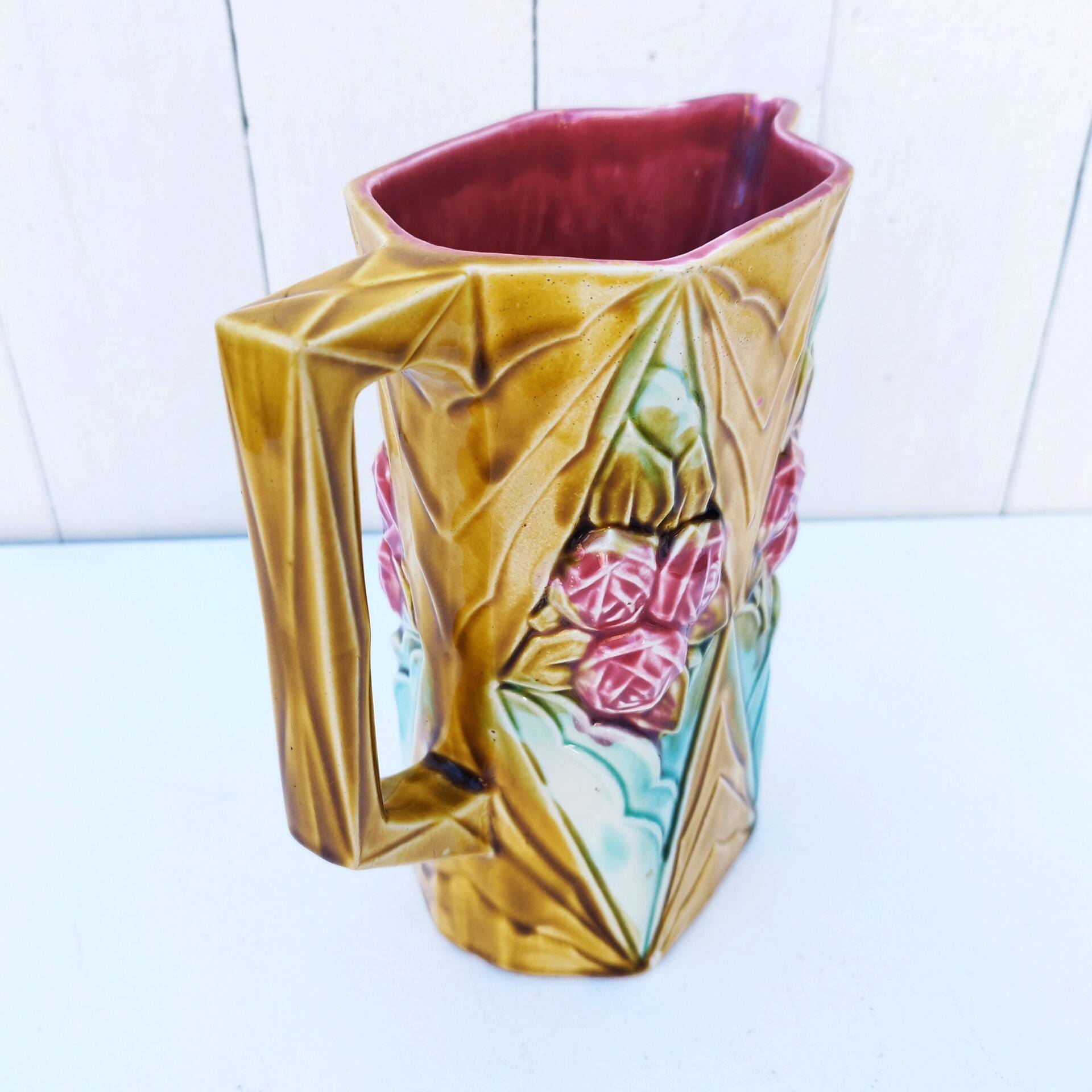 Vintage Onnaing slip rose pitcher