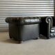 Title: Pair of vintage olive green leather Chesterfield armchairs