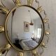 Vintage 1960s witch's eye sun mirror, domed gold metal - 45 cm