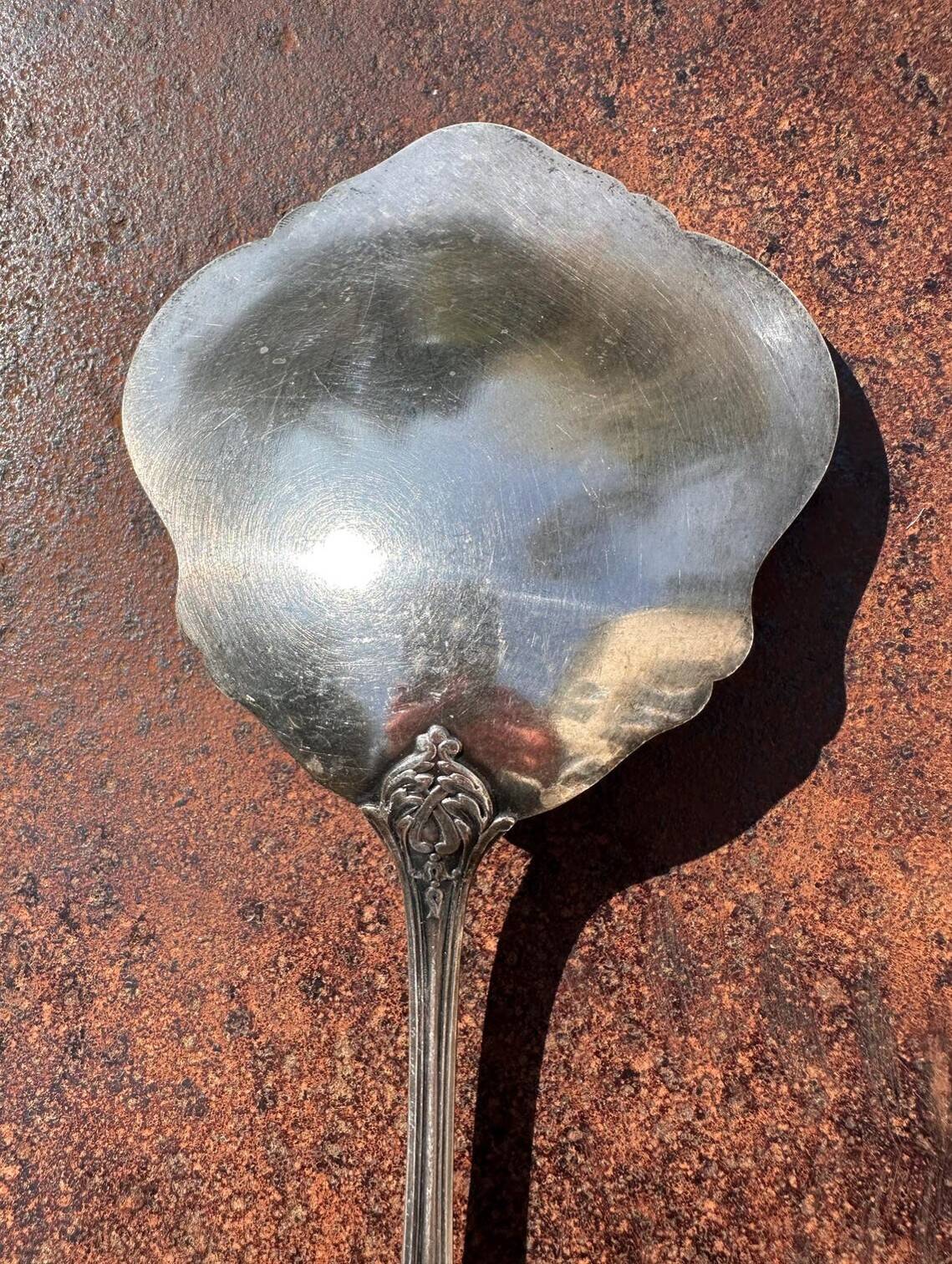 Strawberry spoon or antique Art Nouveau fruit salad in silver metal.