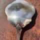 Strawberry spoon or antique Art Nouveau fruit salad in silver metal.