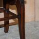 Antique entrance bench by Jas Shoolbred with brass fittings and walnut frame circa 1890.