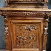 Important pair of two-body buffets in richly carved Renaissance style.