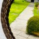 Vintage sun mirror in woven wicker