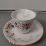 Handmade candle in old cup