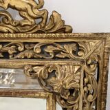Miroir a pare closes de style Louis XIV en bois et stuc doré XIX siècle