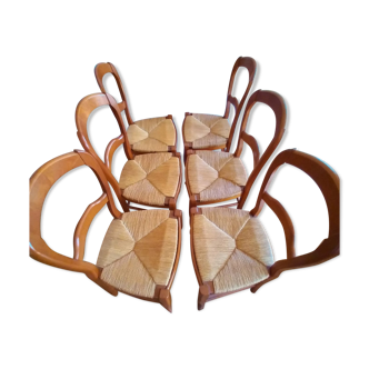 6 mulched solid wood chairs and 2 canework chairs