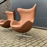2x Fritz Hansen Egg chair by Arne Jacobsen in Cognac leather, new condition!