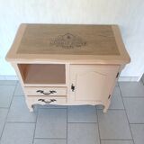 Peach-coloured TV unit