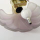 Wall wall lamp shell in pink scribbled glass, gilded metal and brass. Year 70