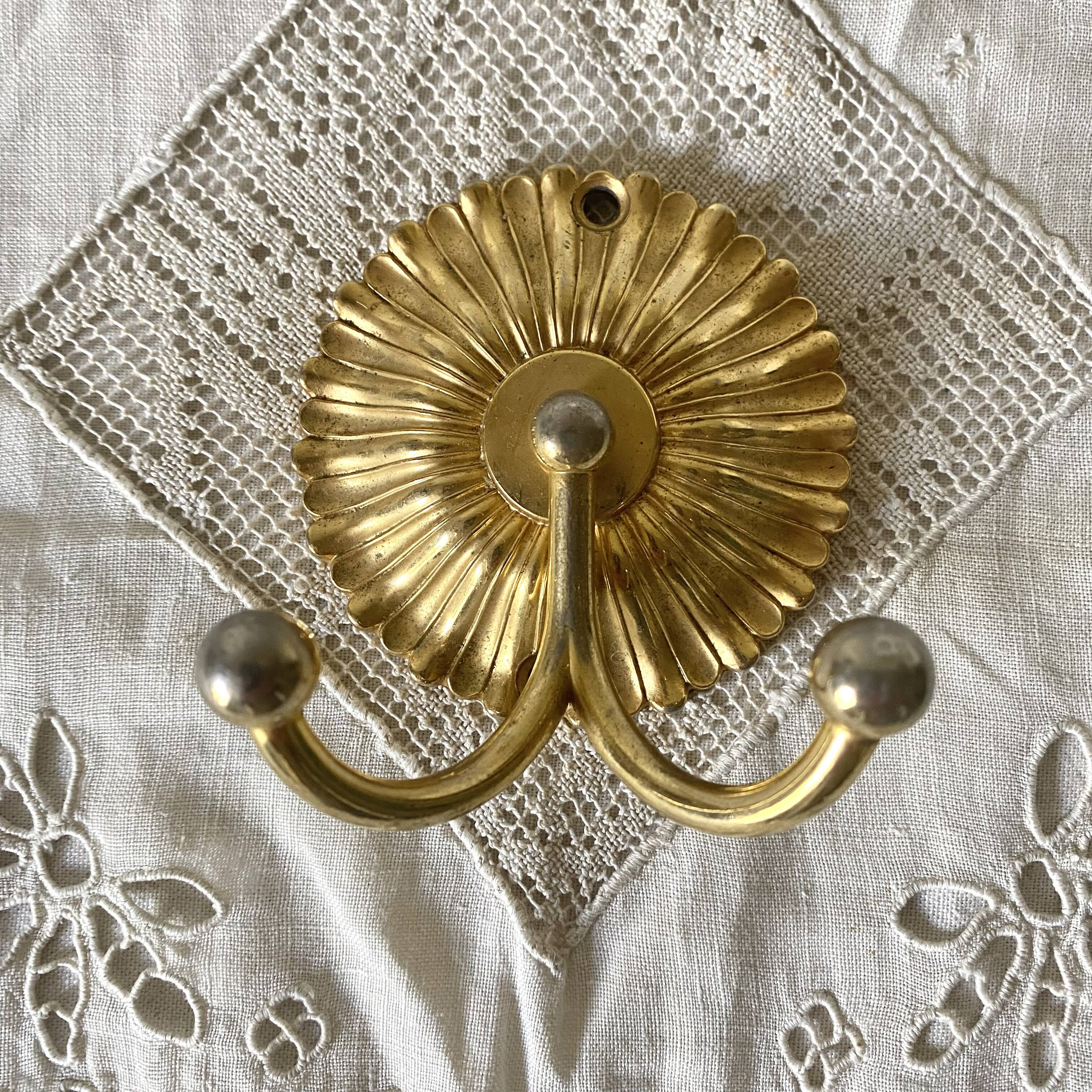 Coat hook, double hook in gold metal