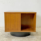 Rotating coffee table magazine holder