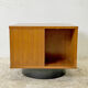 Rotating coffee table magazine holder