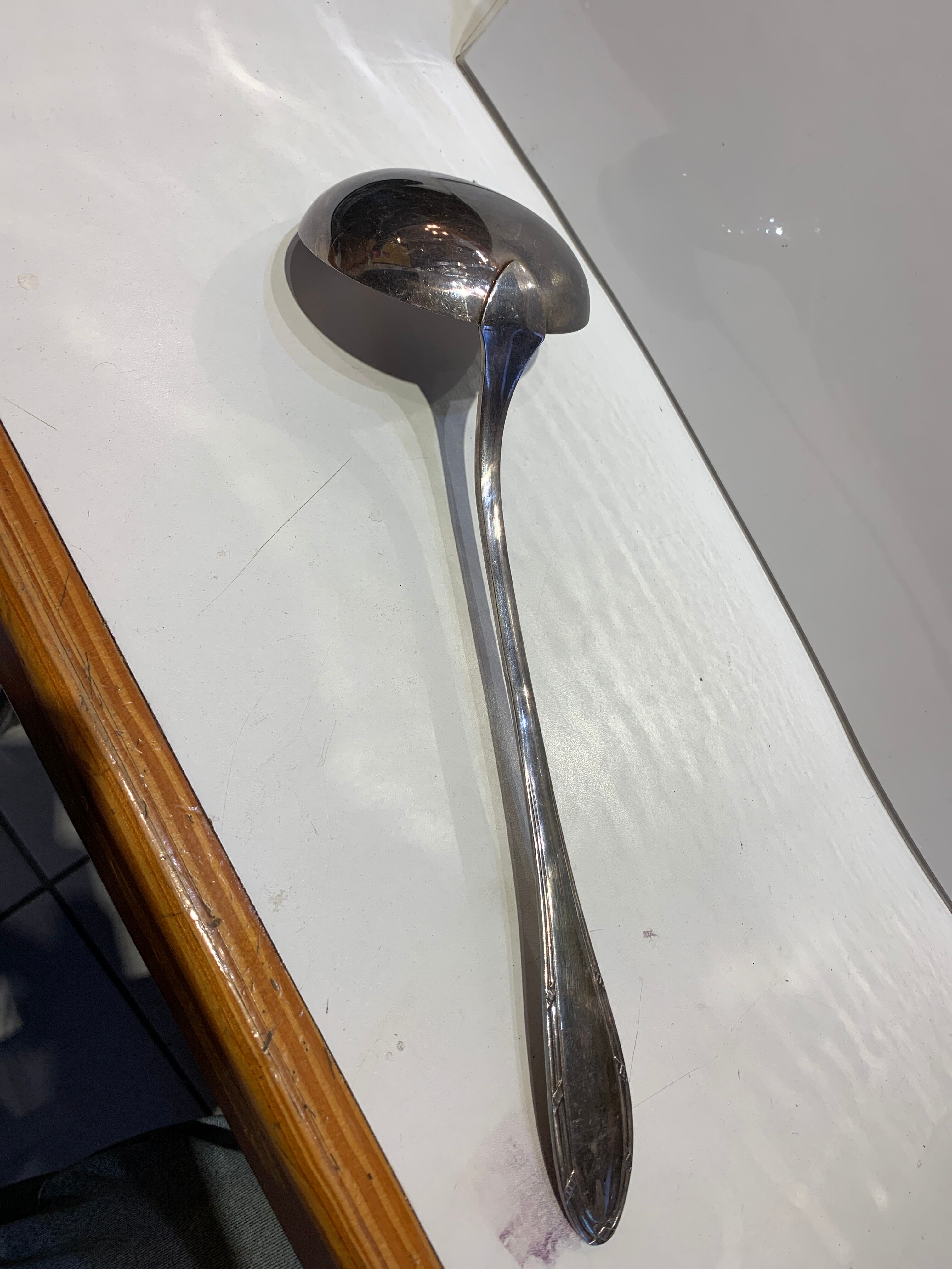 Silver metal ladle