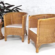 Pair of cabriolet armchairs in wicker and black edging