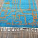Large Moroccan rug made of natural wool, dimensions 250x150 cm, handmade.
