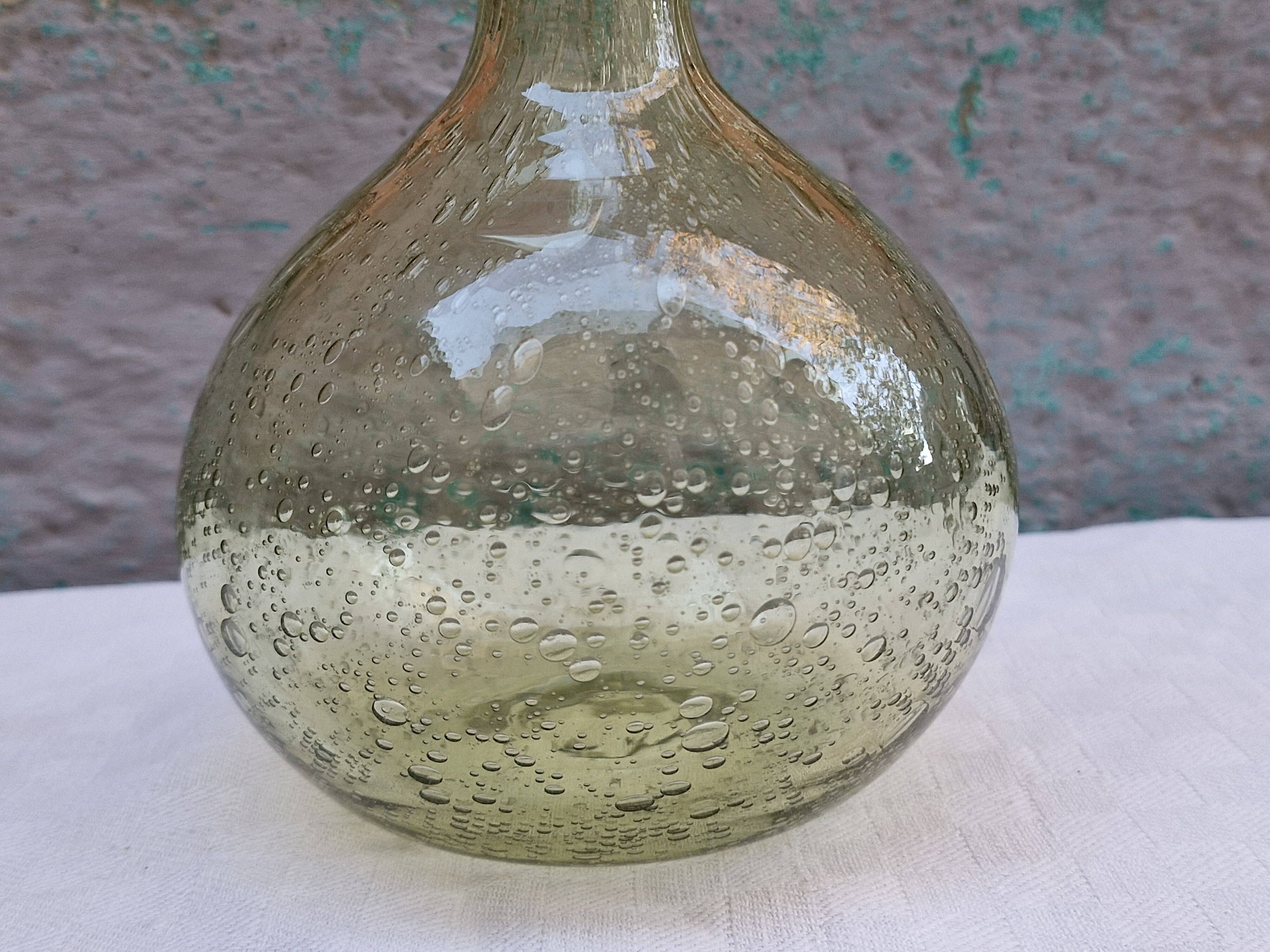 Vintage carafe signed Biot, blown glass, bubbled.