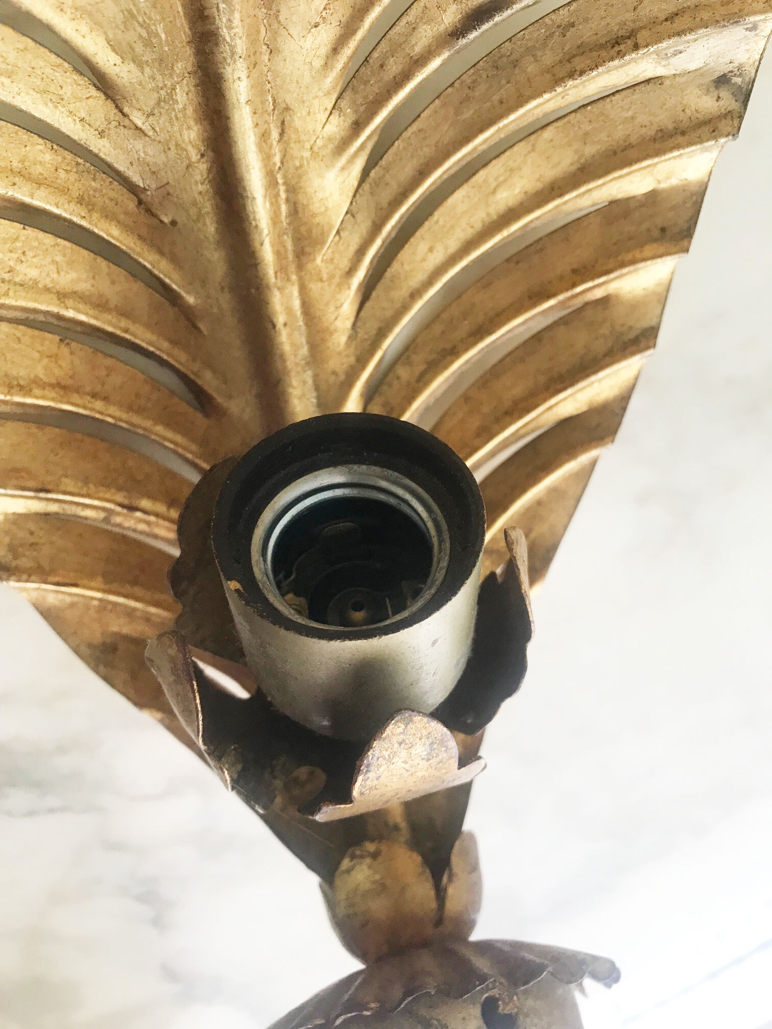 Gold metal leaf wall light