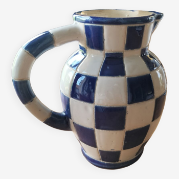 Blue and white checkerboard water pitcher