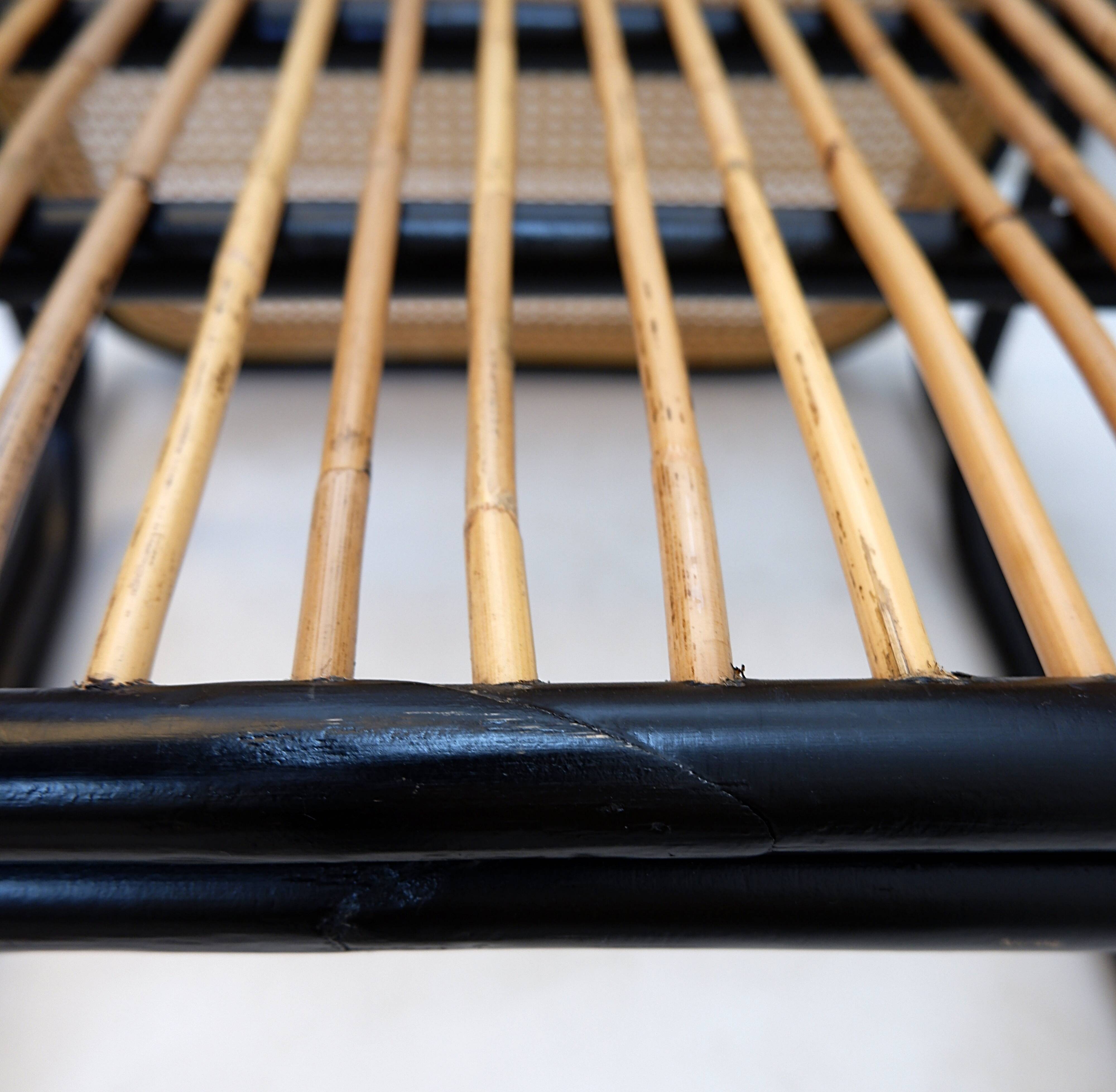 Pair of designer armchairs in curved wood and wicker