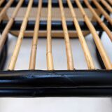 Pair of designer armchairs in curved wood and wicker