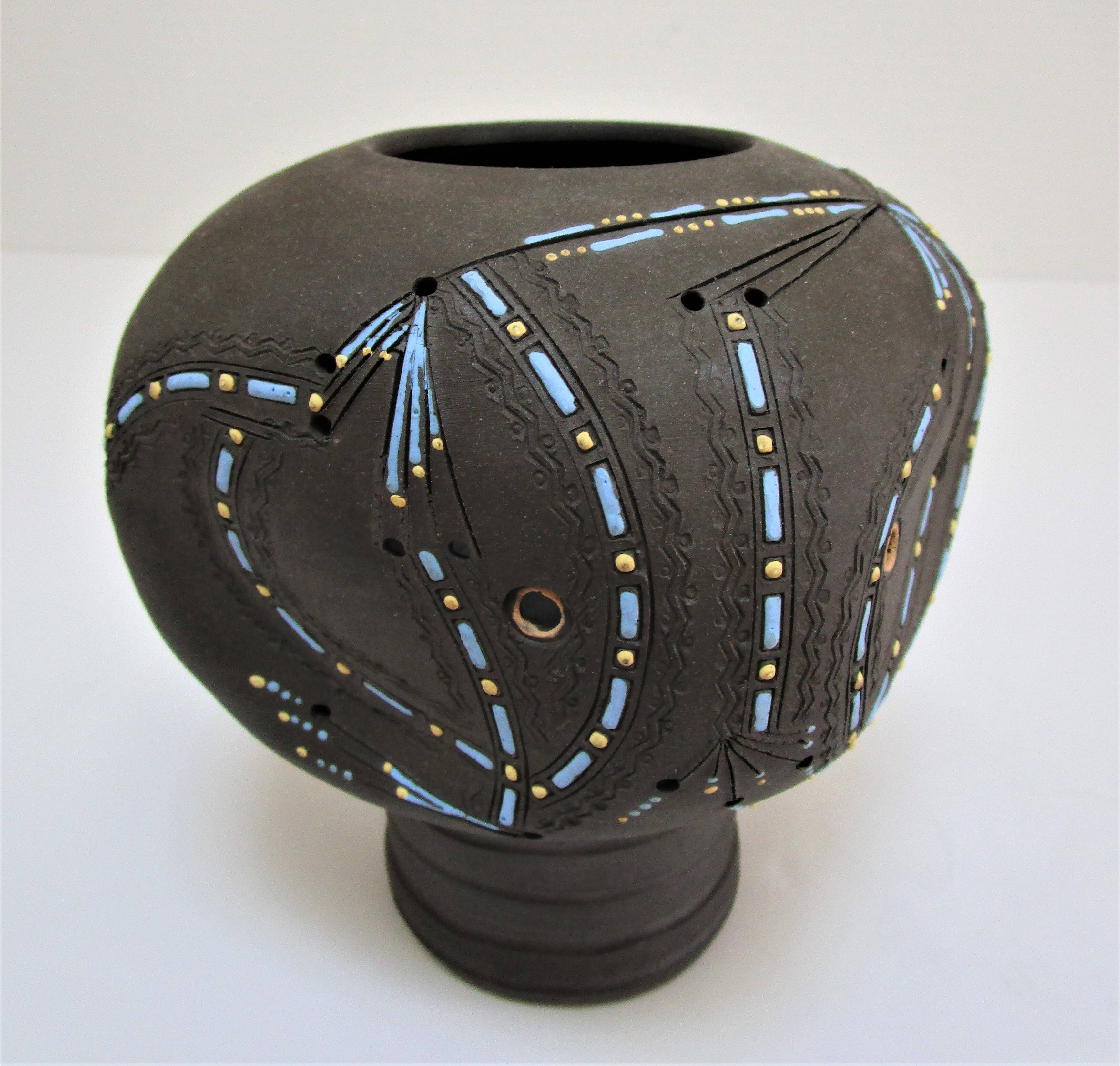 Anthropomorphic candle holder, scarified ceramic, stamped design